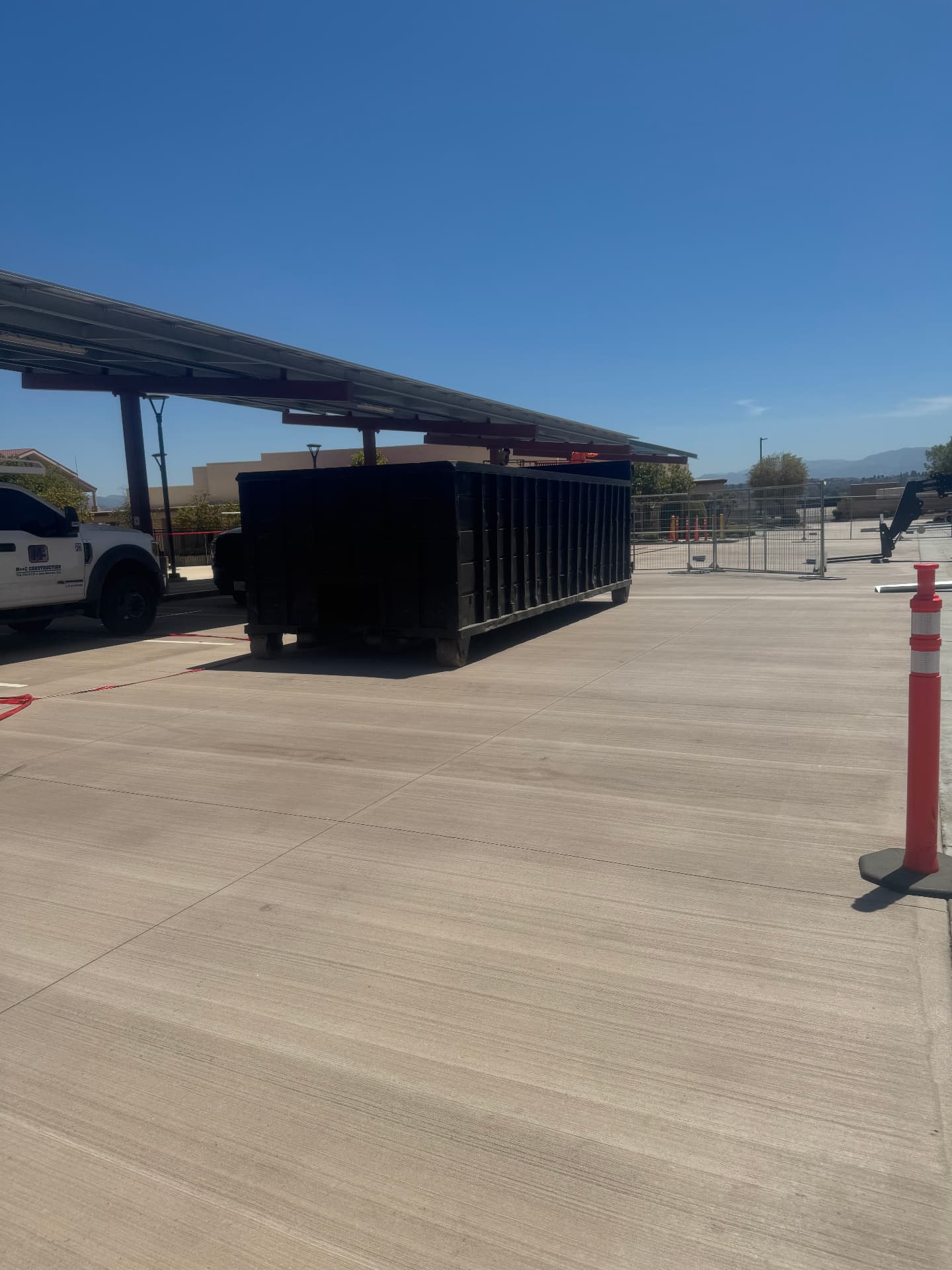 Roll-off dumpster rental serving the Santa Clarita Valley, CA SCV Dumpsters roll-off dumpster delivered on a concrete lot in the Santa Clarita Valley